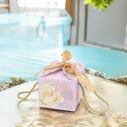 Cutie mică cu panglică și mâner din sfoară model floral - mov (set 50 buc)