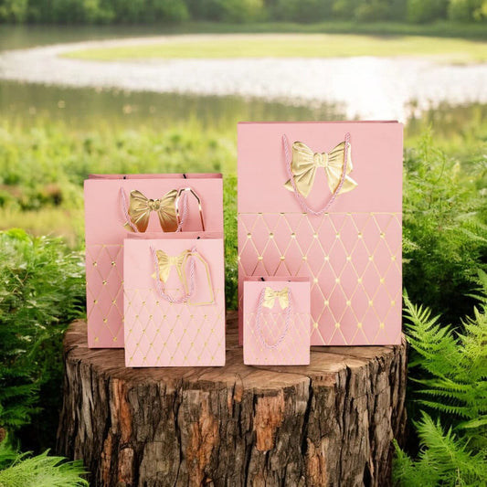Pungi cadou cu mâner model fundă și romburi aurii 26x32x12cm - roz (set 12 buc)