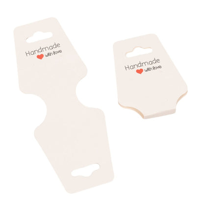Suport în formă de trapez cu adeziv si mesaj Handmade with love - alb (set 100 buc)